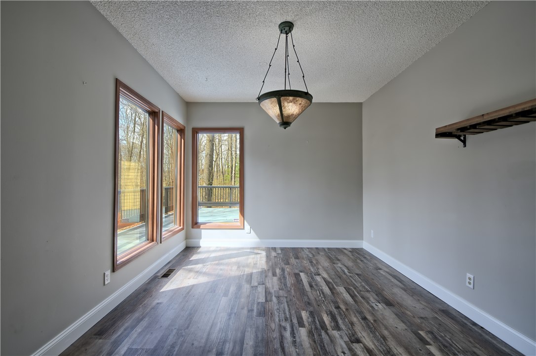 8711 Nicole Lane Springboro, OH 45066 - Photo 18 of 87 This versatile room boasts ample natural light and durable flooring, perfect for various living arrangements.