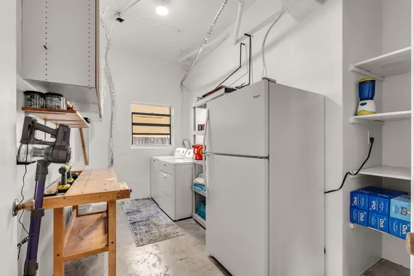 a view of a park with sitting area