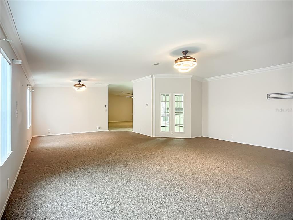 8307 Nancy Lane Ellenton, FL 34222 - Photo 11 of 56 a view of an empty room with a window