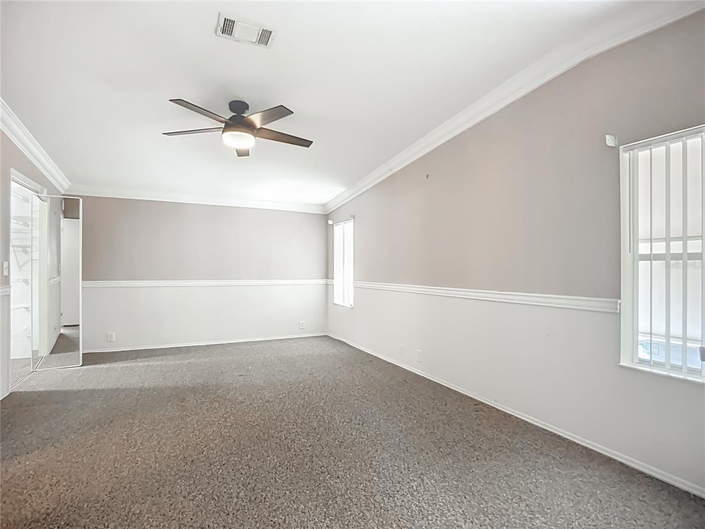 8307 Nancy Lane Ellenton, FL 34222 - Photo 15 of 56 a view of an empty room with a window
