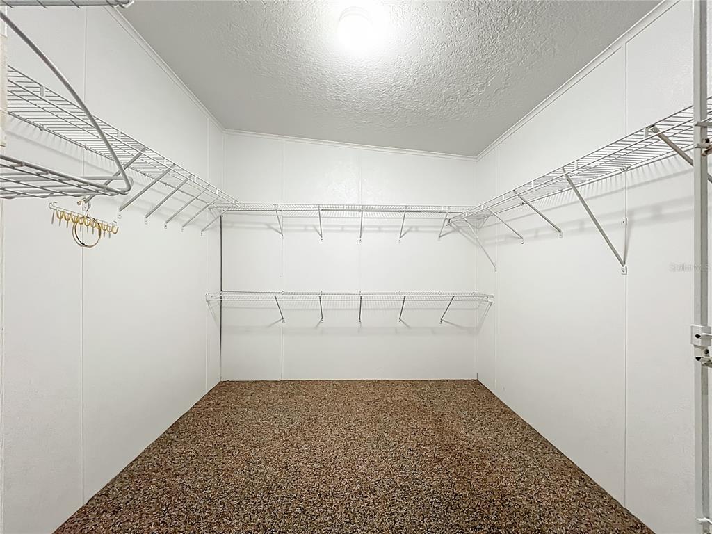 8307 Nancy Lane Ellenton, FL 34222 - Photo 16 of 56 a view of a room with racks on the wall