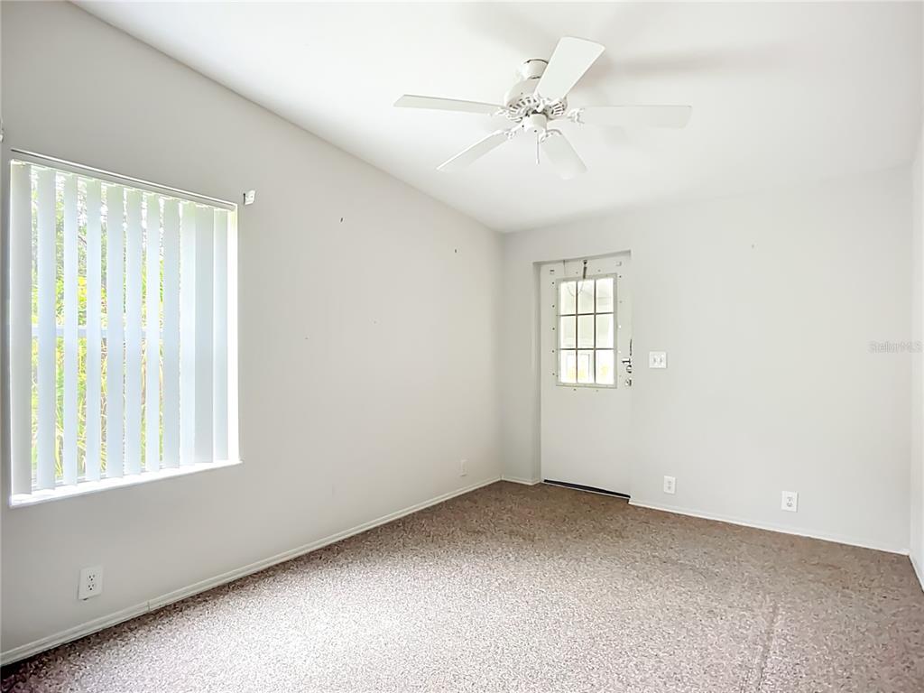 8307 Nancy Lane Ellenton, FL 34222 - Photo 22 of 56 an empty room with a window