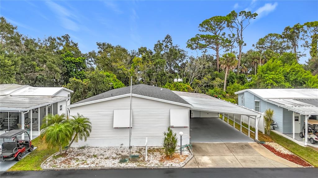 8307 Nancy Lane Ellenton, FL 34222 - Photo 33 of 56 a backyard of a house with lots of green space