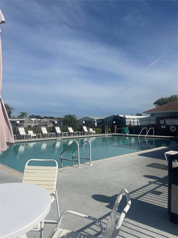 8307 Nancy Lane Ellenton, FL 34222 - Photo 40 of 56 a view of a swimming pool with a terrace