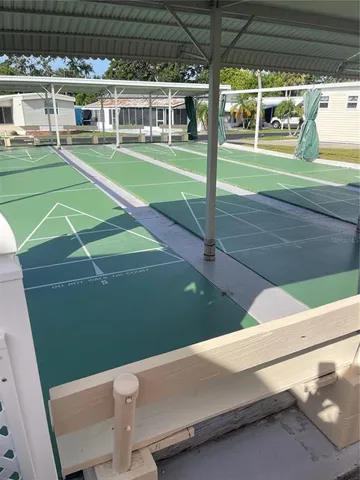 an aerial view of residential houses with city view