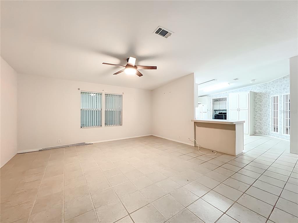 8307 Nancy Lane Ellenton, FL 34222 - Photo 8 of 56 a view of a kitchen with furniture and windows
