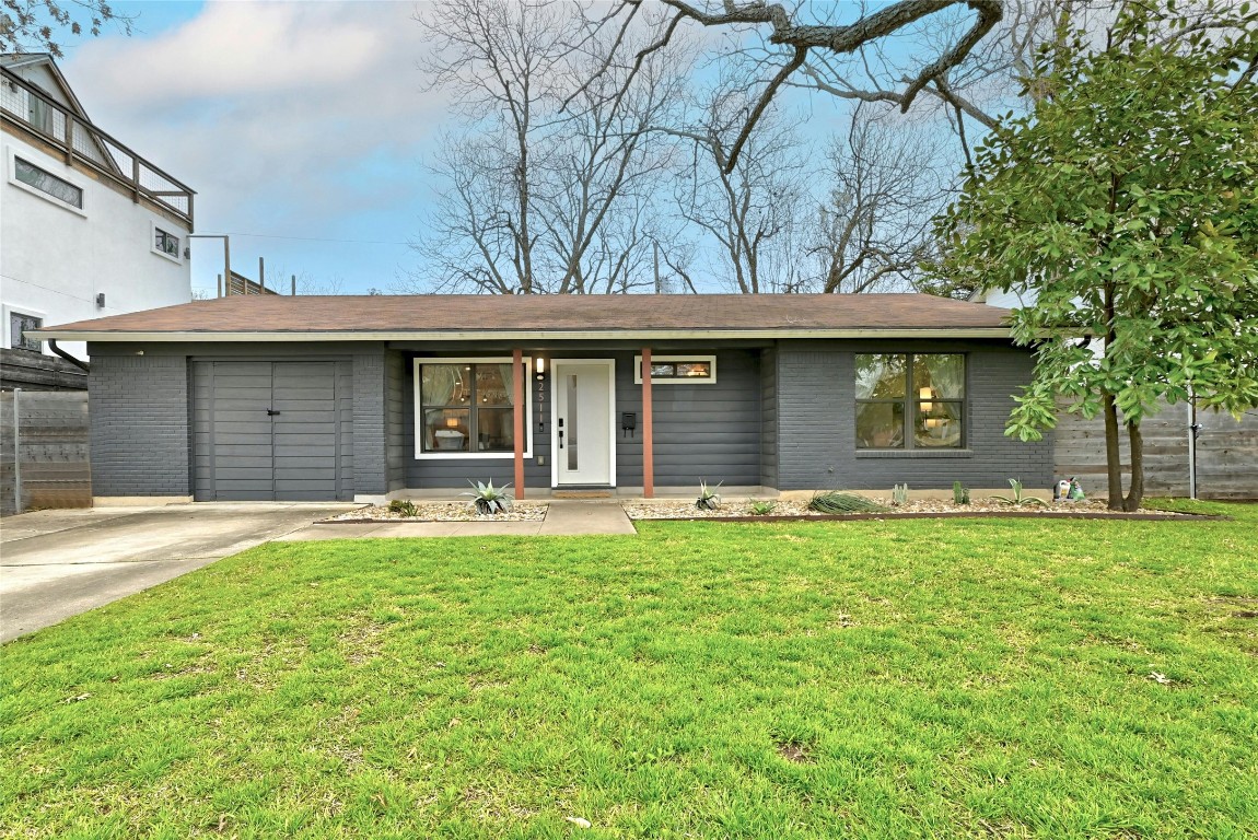 2511 Friar Tuck Lane Austin, TX 78704 - Photo 4 of 21 a house view with a garden space