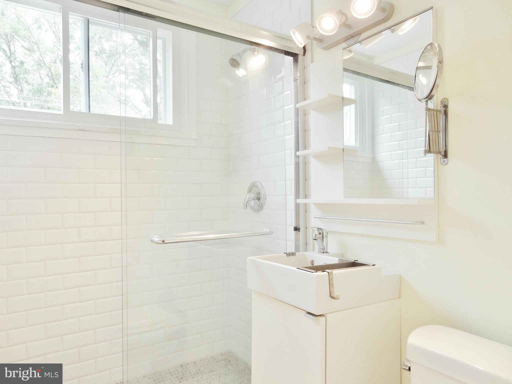 59 Ridge Road, Unit D Greenbelt, MD 20770 - Photo 2 of 8 Bath With Glass Shower Doors