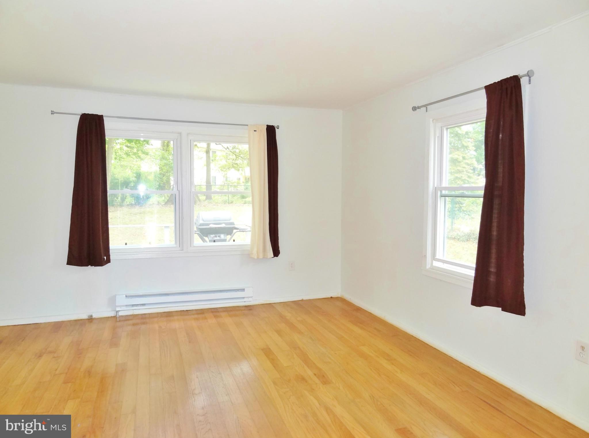 59 Ridge Road, Unit D Greenbelt, MD 20770 - Photo 4 of 8 Living Room With Oak Hardwood Flooring
