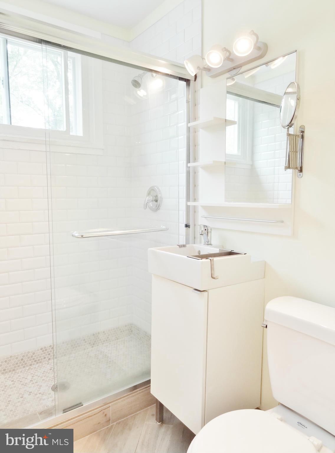 59 Ridge Road, Unit D Greenbelt, MD 20770 - Photo 5 of 8 Ceramic-Tiled Bath