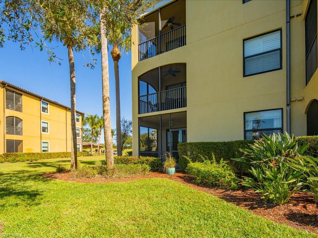 9719 Acqua Court, Unit 218 Naples, FL 34113 - Photo 23 of 23 View of apartment building / complex