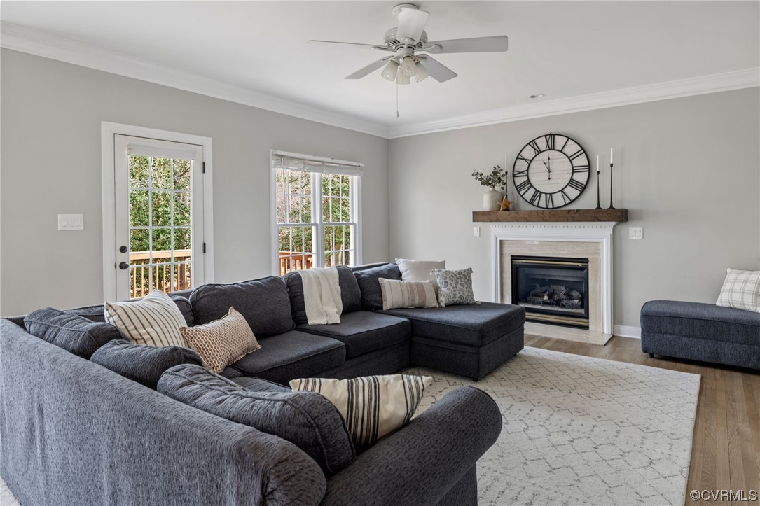 820 Club Ridge Court Chester, VA 23836 - Photo 14 of 38 a living room with furniture a fireplace and a window