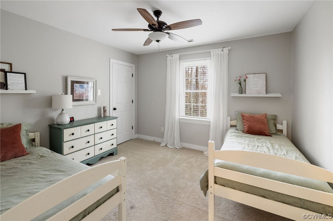 820 Club Ridge Court Chester, VA 23836 - Photo 22 of 38 a bedroom with a bed and a dresser