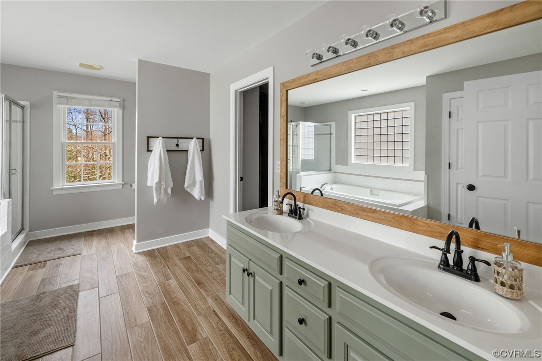 820 Club Ridge Court Chester, VA 23836 - Photo 26 of 38 a bathroom with double vanity sink a mirror and a shower
