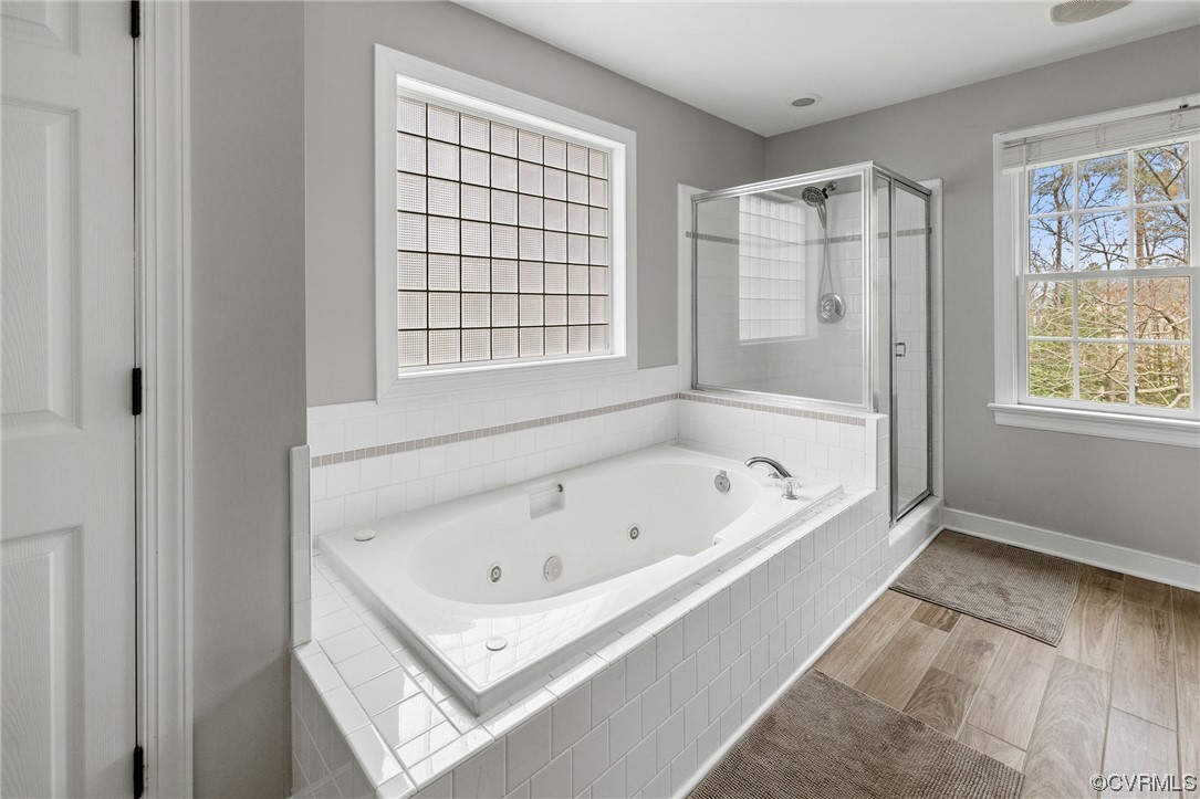 820 Club Ridge Court Chester, VA 23836 - Photo 27 of 38 a white bath tub sitting next to a window