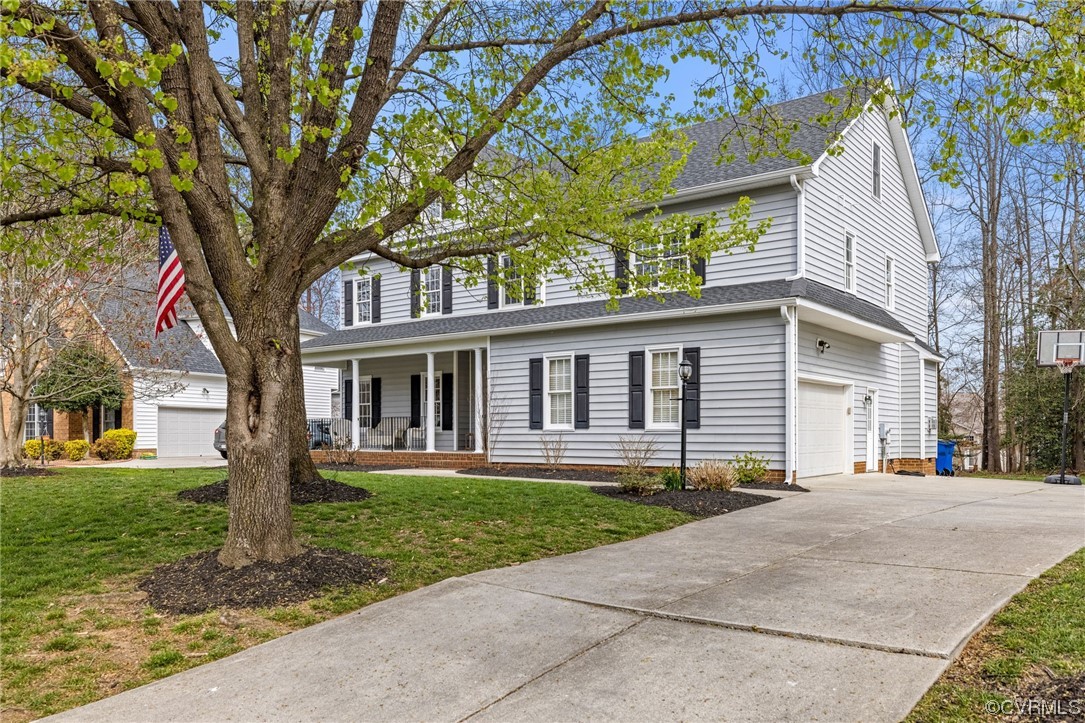 820 Club Ridge Court Chester, VA 23836 - Photo 3 of 38 a front view of house with yard and green space