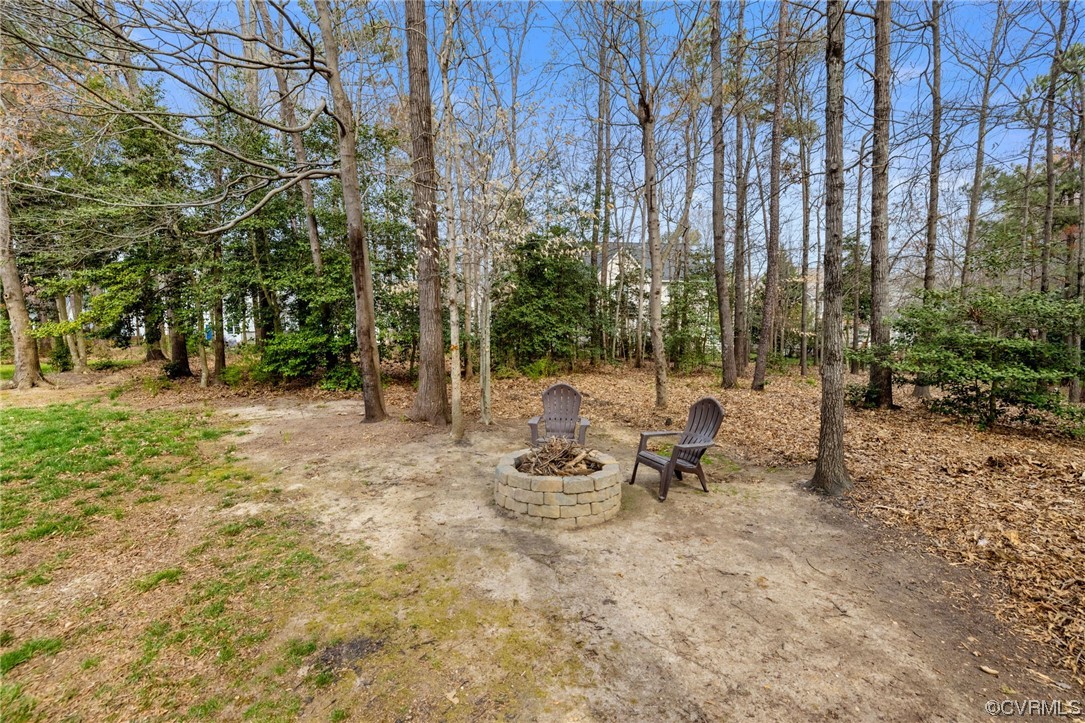 820 Club Ridge Court Chester, VA 23836 - Photo 35 of 38 a view of a bench in a backyard