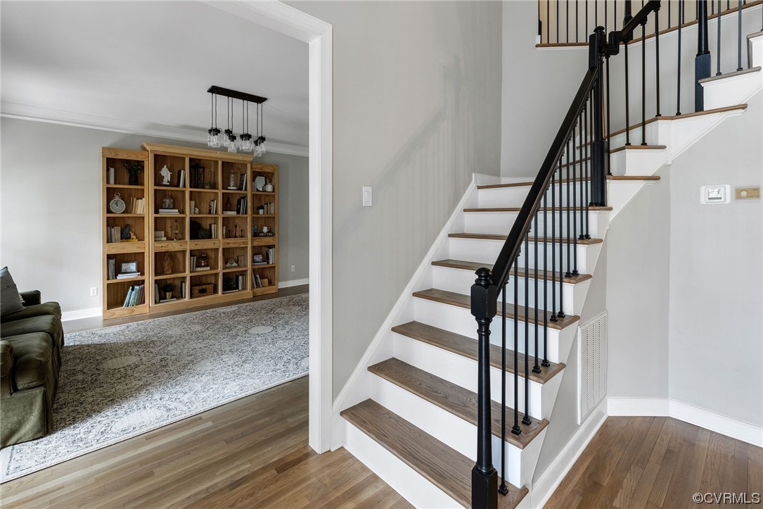 820 Club Ridge Court Chester, VA 23836 - Photo 5 of 38 a view of entryway with wooden floor and front door