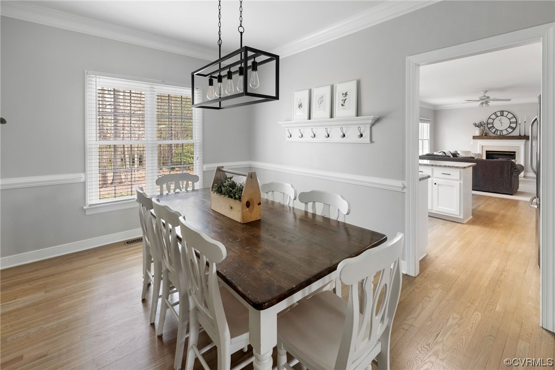 820 Club Ridge Court Chester, VA 23836 - Photo 8 of 38 a view of a dining room with furniture window and wooden floor