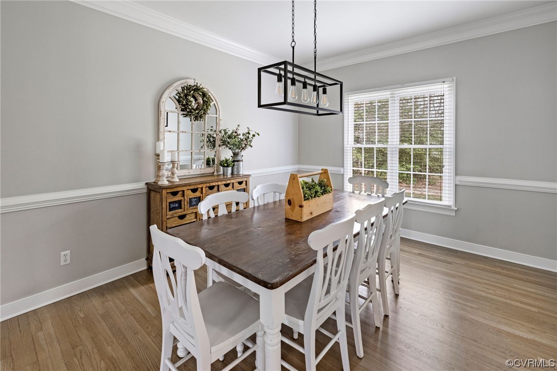 820 Club Ridge Court Chester, VA 23836 - Photo 9 of 38 a view of a dining room with furniture window and wooden floor