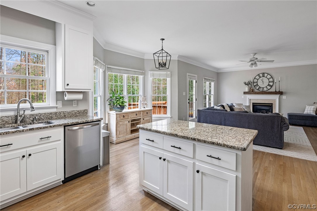 820 Club Ridge Court Chester, VA 23836 - Photo 38 of 38 a kitchen with granite countertop counter top space a sink stainless steel appliances and windows