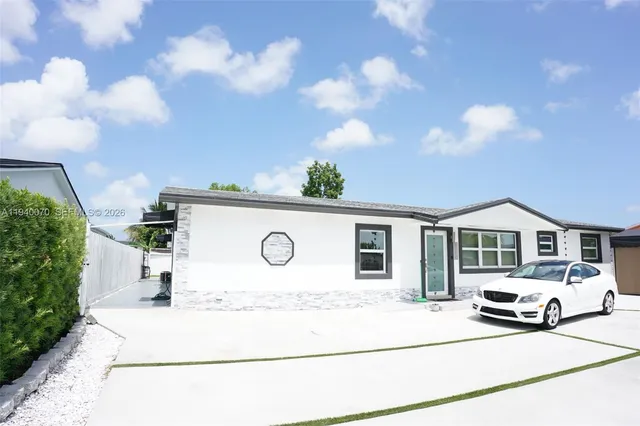 a house view with a outdoor space