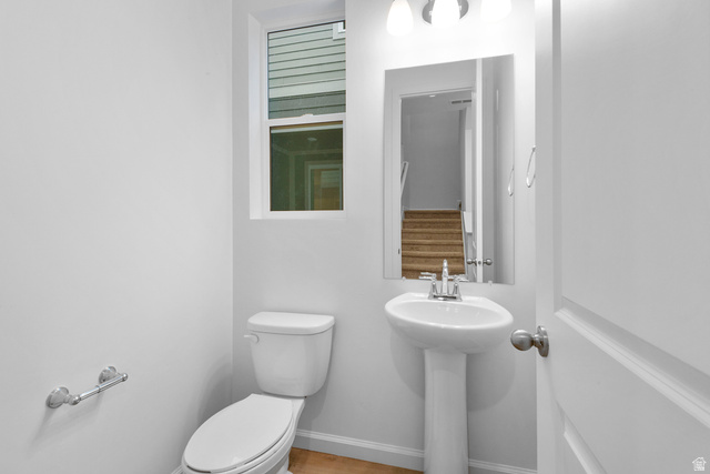 1302 East 1670th North, Unit 908 Payson, UT 84651 - Photo 7 of 21 Half bath with toilet and baseboards