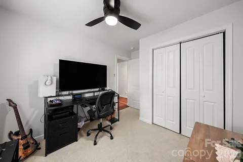 a livingroom with lounge chair