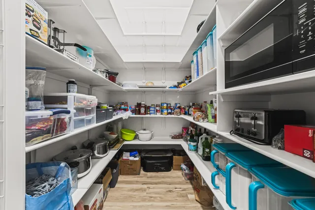 a kitchen with stainless steel appliances granite countertop lots of counter and cabinets