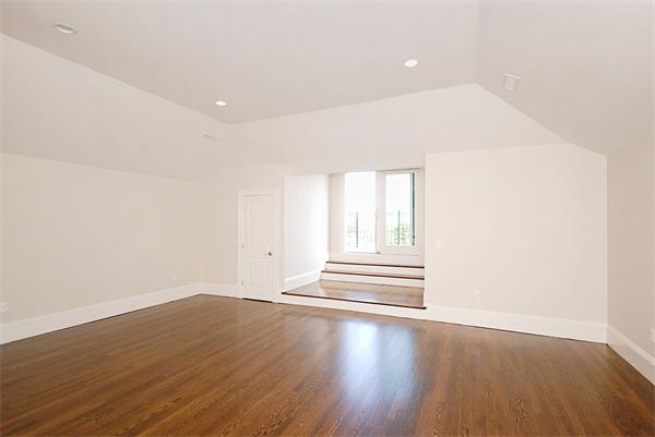 34 Rawson Road, Unit 2 Brookline, MA 02445 - Photo 18 of 24 a view of empty room with wooden floor and fan