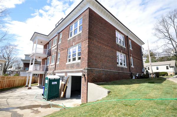 34 Rawson Road, Unit 2 Brookline, MA 02445 - Photo 23 of 24 a view of a house with a patio