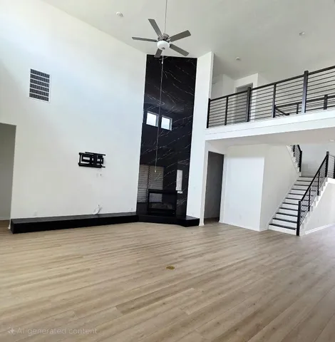 a view of a livingroom with wooden floor