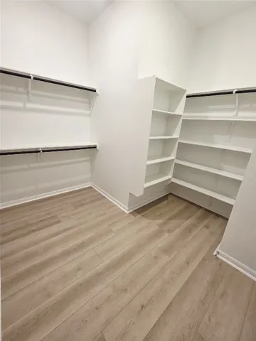 a view of an empty walk in closet