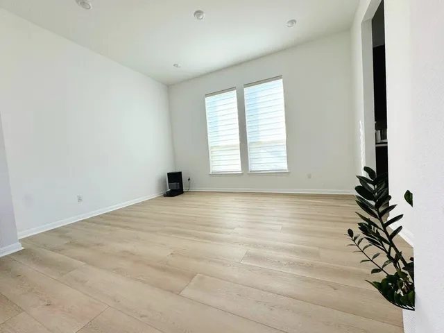 an empty room with windows