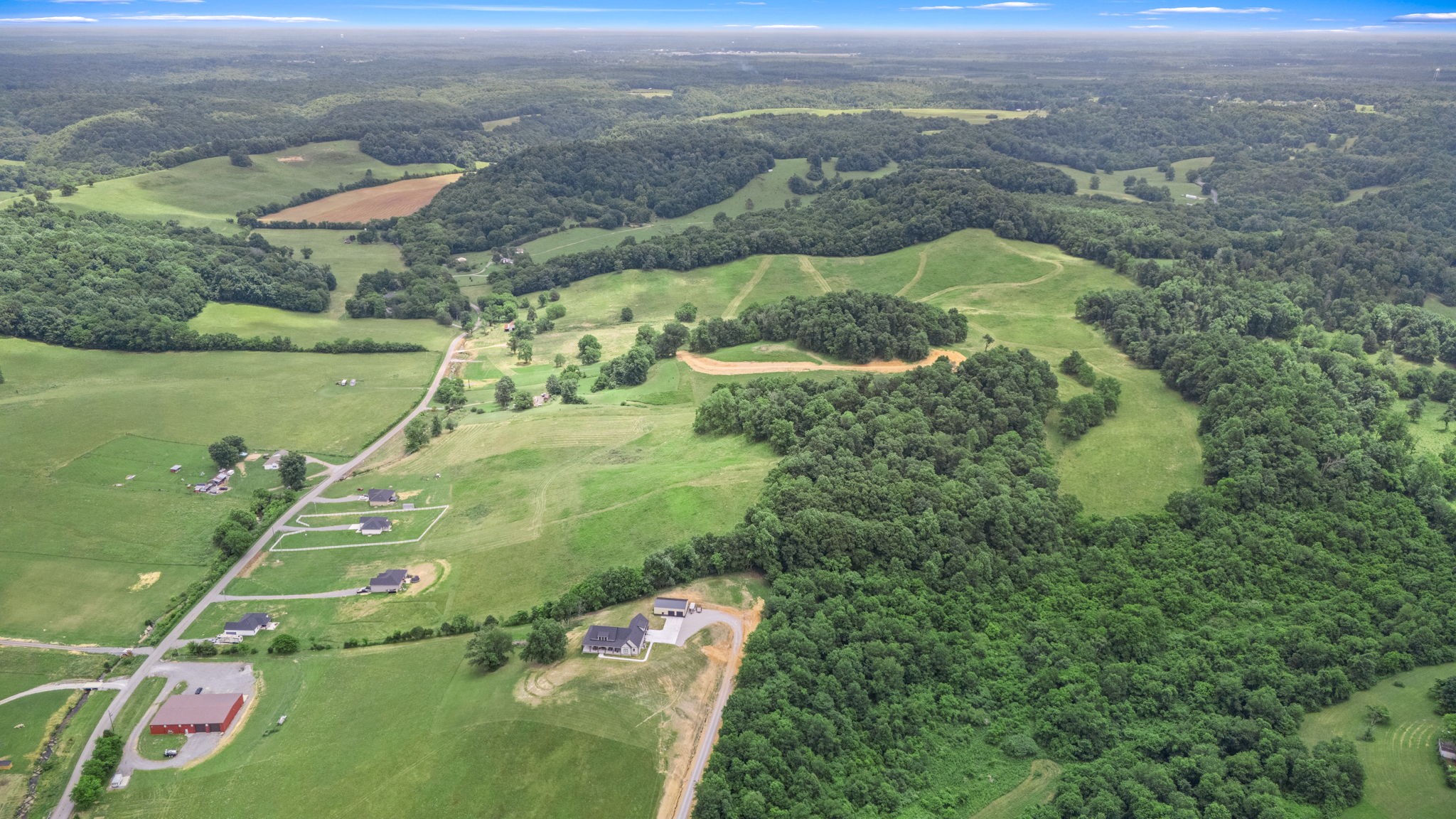 0 John Brinkley Road Tullahoma, TN 37388 - Photo 2 of 6 an aerial view of a houses with a yard