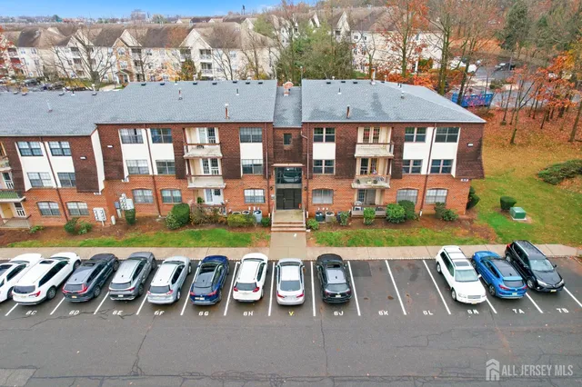 a view of a swimming pool with lounge chairs