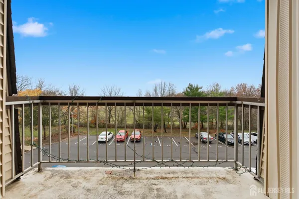 a view of a balcony with city view