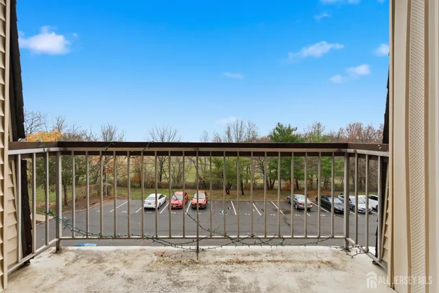 a view of a balcony with city view
