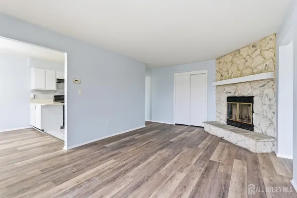 a kitchen with a sink cabinets and appliances