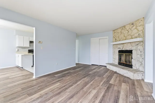 a kitchen with a sink cabinets and appliances