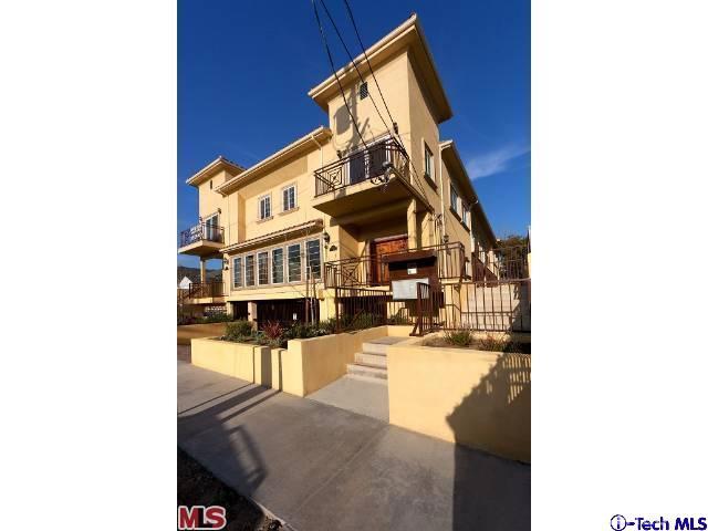 10214 Fernglen Avenue, Unit 5 Tujunga, CA 91042 - Photo 1 of 1 a view of a balcony and chairs