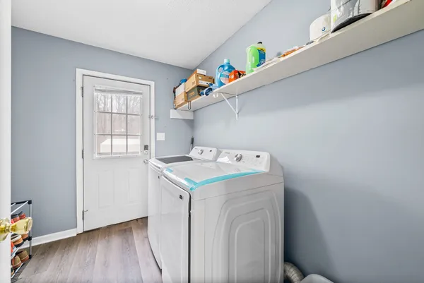 a utility room with dryer and washer