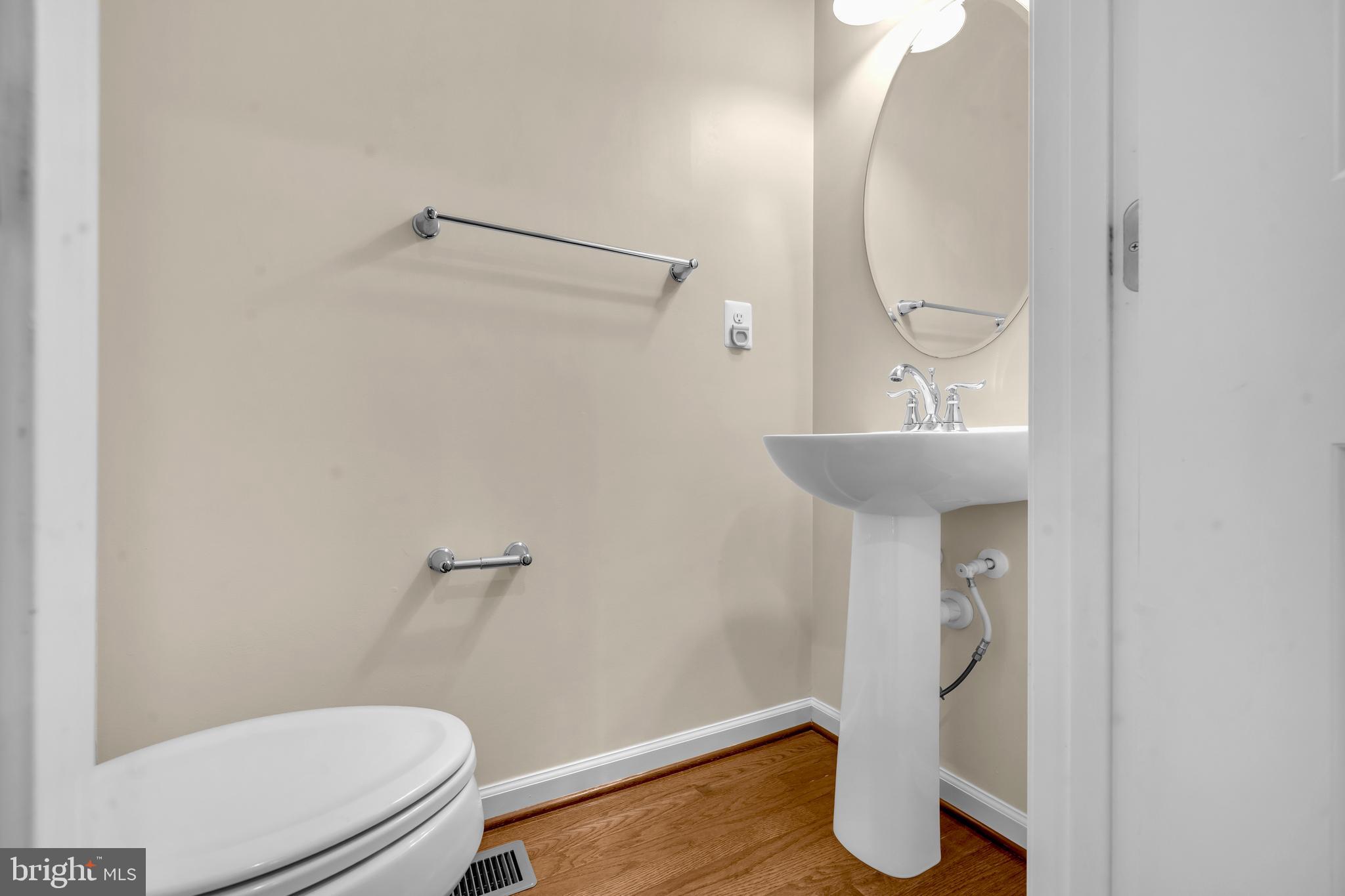 41663 McMonagle Square Aldie, VA 20105 - Photo 11 of 50 a bathroom with a toilet and a sink