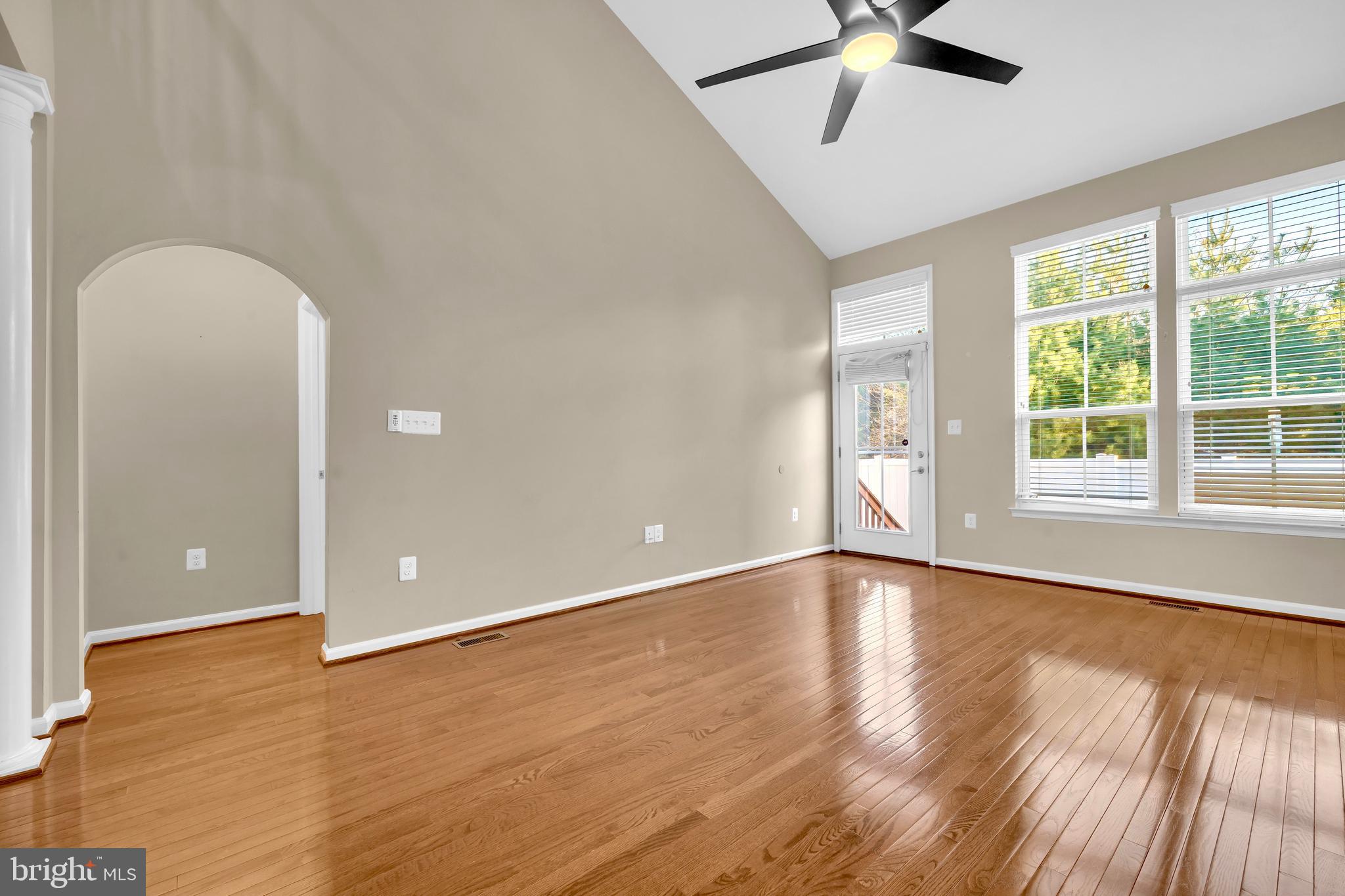 41663 McMonagle Square Aldie, VA 20105 - Photo 19 of 50 wooden floor in an empty room with a window