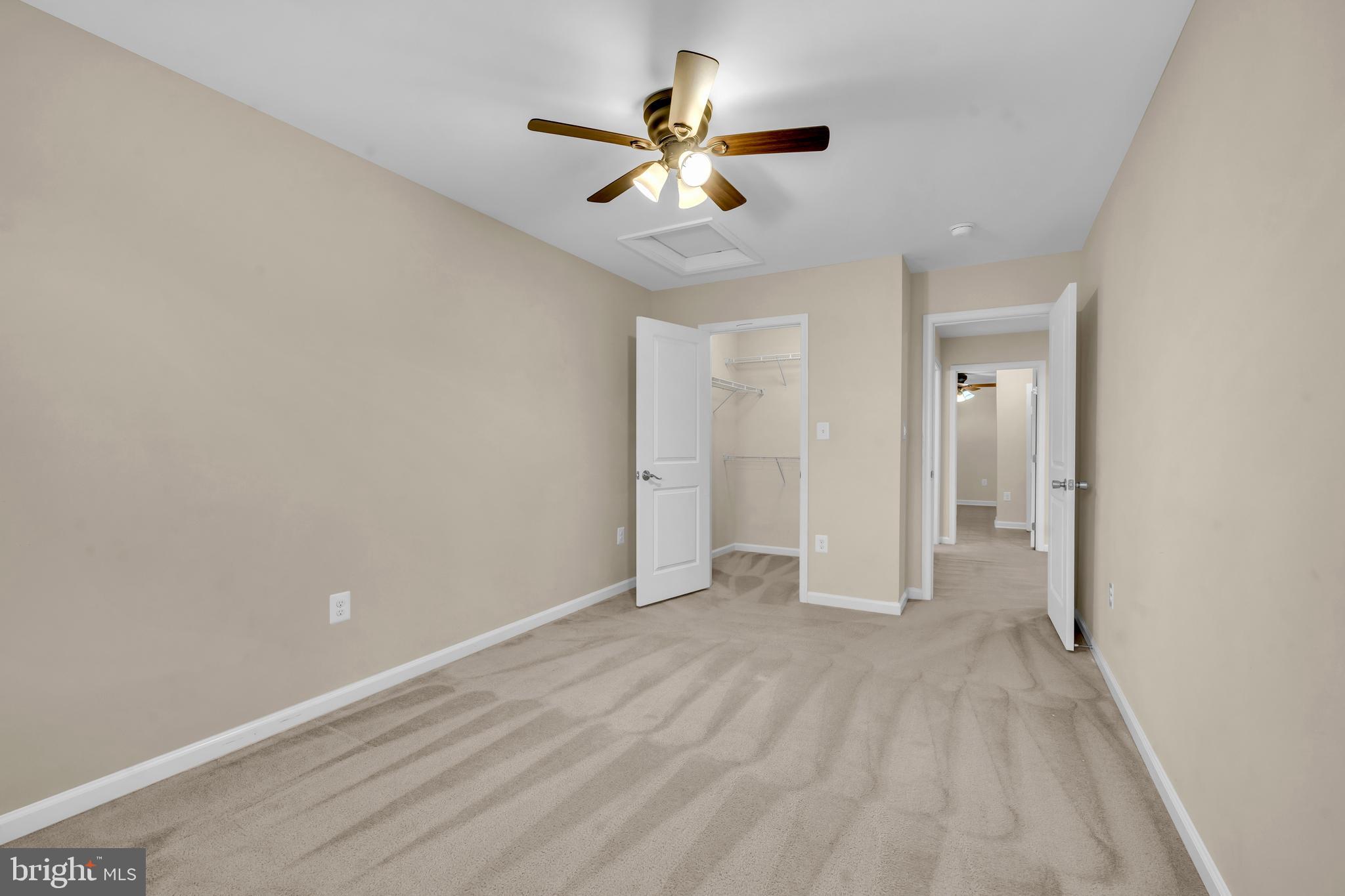 41663 McMonagle Square Aldie, VA 20105 - Photo 32 of 50 a view of an empty room and chandelier fan