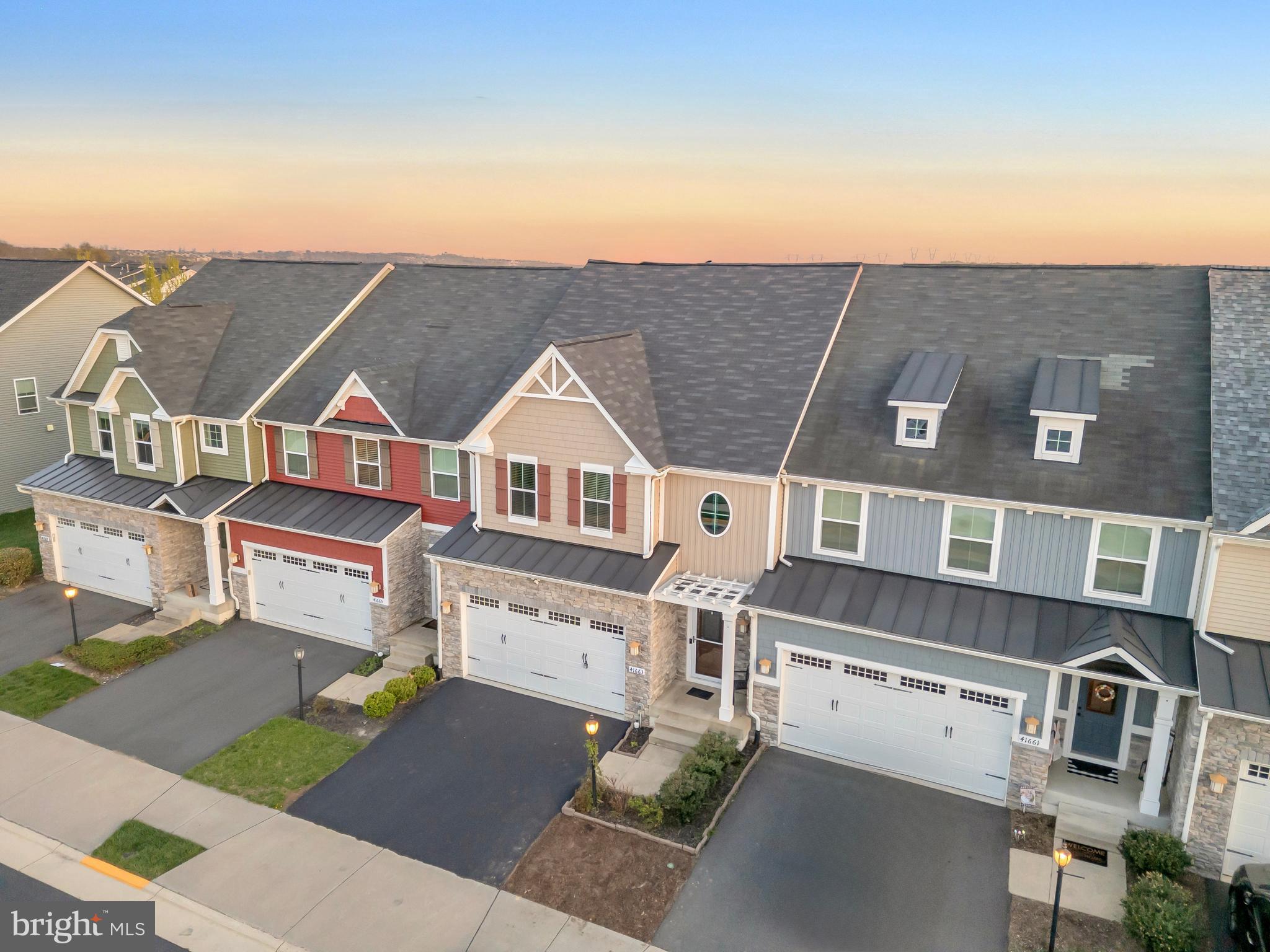 41663 McMonagle Square Aldie, VA 20105 - Photo 44 of 50 a view of a city with tall buildings
