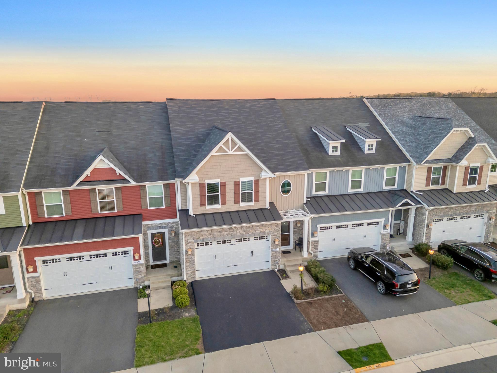 41663 McMonagle Square Aldie, VA 20105 - Photo 45 of 50 an aerial view of a house with garden