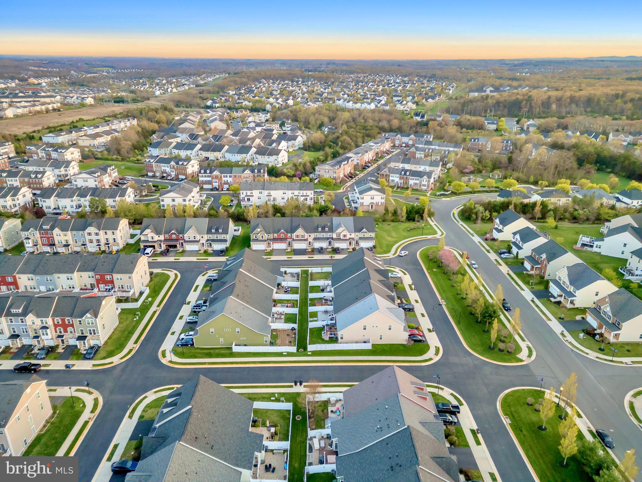 41663 McMonagle Square Aldie, VA 20105 - Photo 47 of 50 an aerial view of a swimming pool patio and mountain view