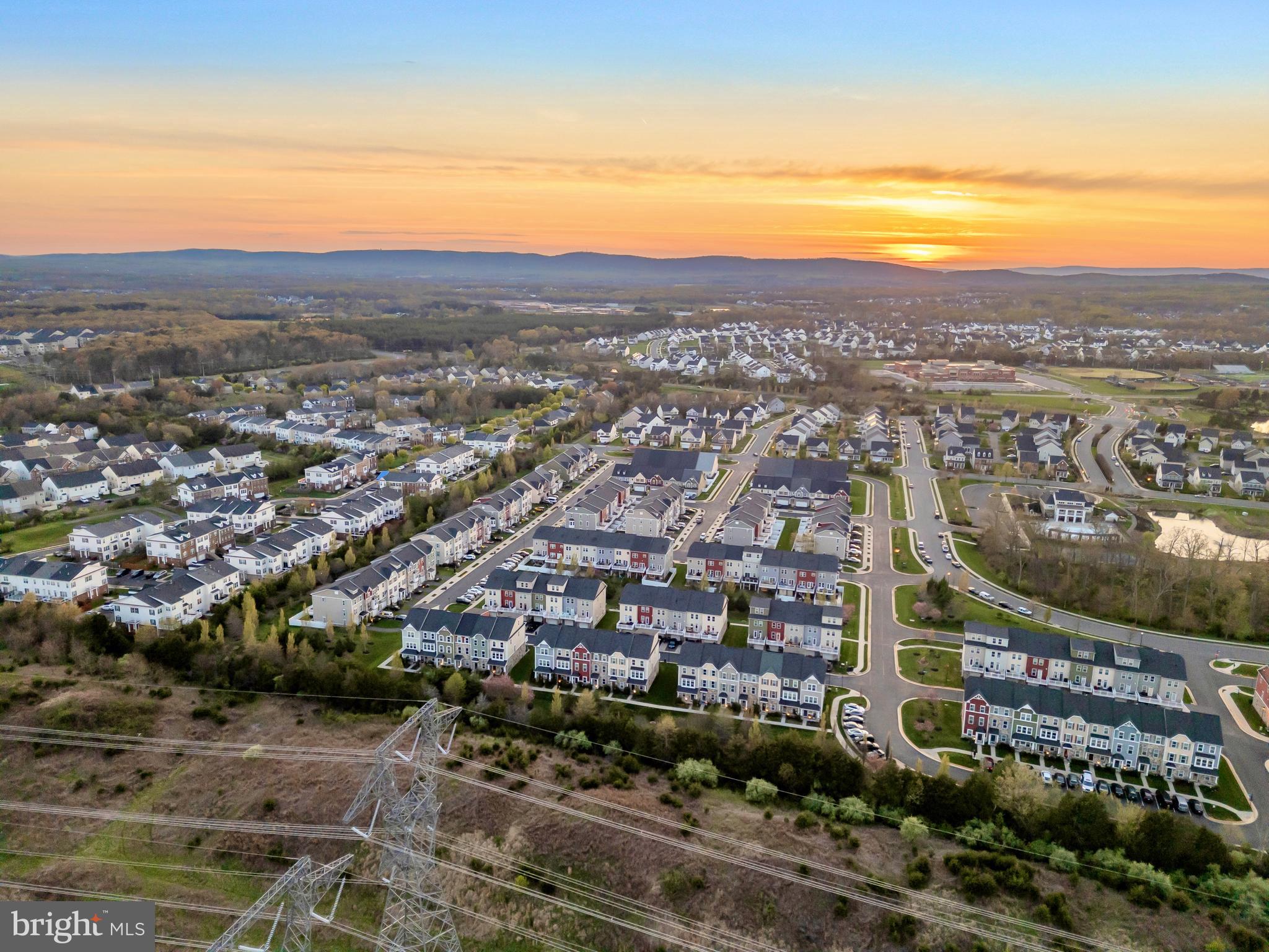 41663 McMonagle Square Aldie, VA 20105 - Photo 49 of 50 an aerial view of residential houses with outdoor space and ocean view