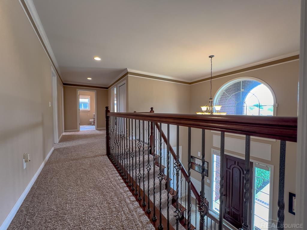 16070 Moore Park Road Macomb, MI 48044 - Photo 38 of 76 Upper level hall measures 24' x 7' & adjoins the 4 bedrooms, bath, & linen closet. Separate linen closet also found in main bath.